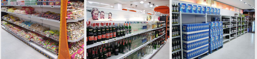 Gondola con cestas para caramelos y golosinas, gondola para bebidas y mural de media carga para otras bebibas en packs